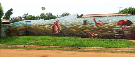 Imagen que contiene pasto, exterior, agua, hombre  Descripción generada automáticamente